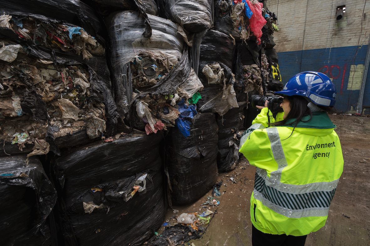 EA staff inspecting a local waste site