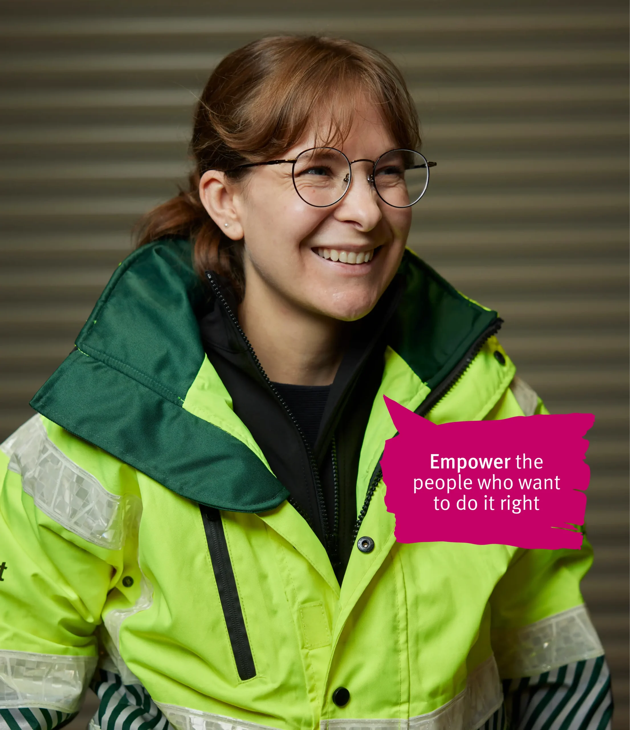 Women in yellow vest smiling