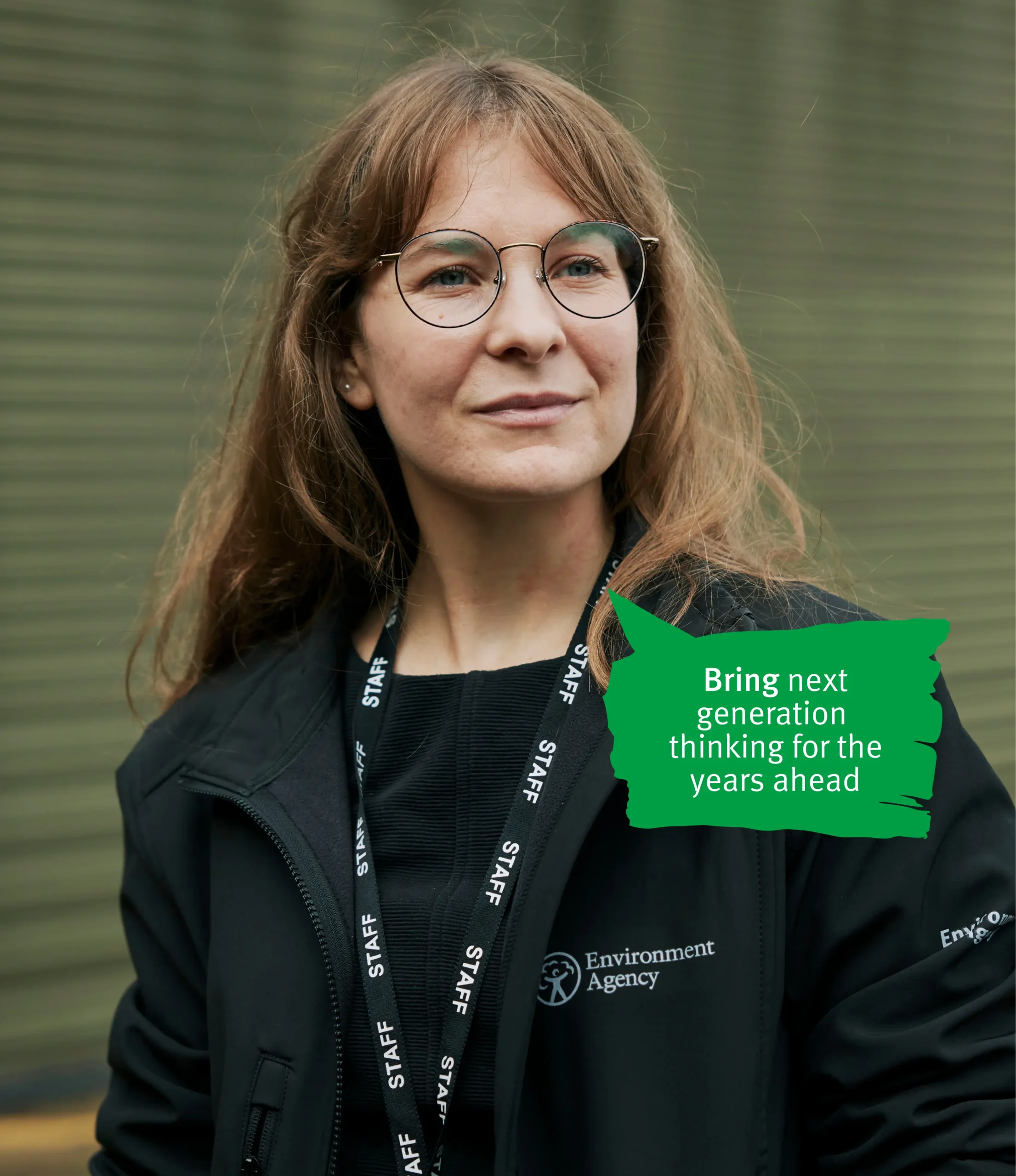 Women inblack jacket standing