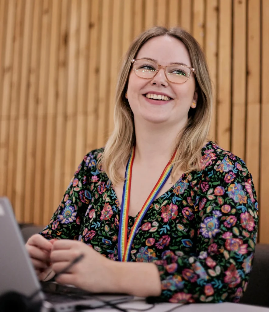 Women in glasses smiling